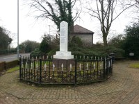 Cronton War Memorial and Village Stocks